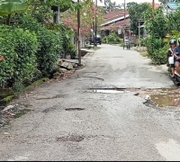 Jalan Rusak Dan Berlubang, Warga Kandis Ujung Kelurahan Tangkerang Utara  Minta PJ Walikota Pekanbaru Dan Sekda Memperbaikinya